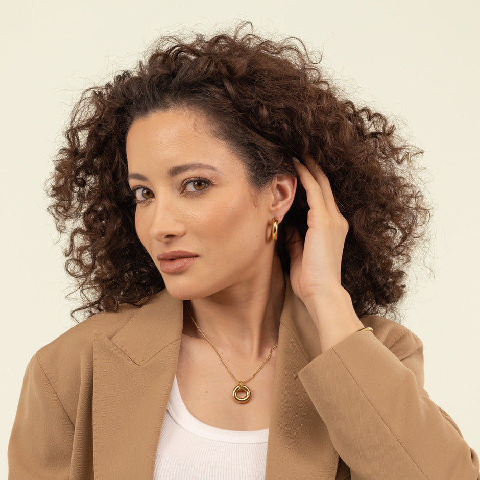 قرط نسائي ذهبي