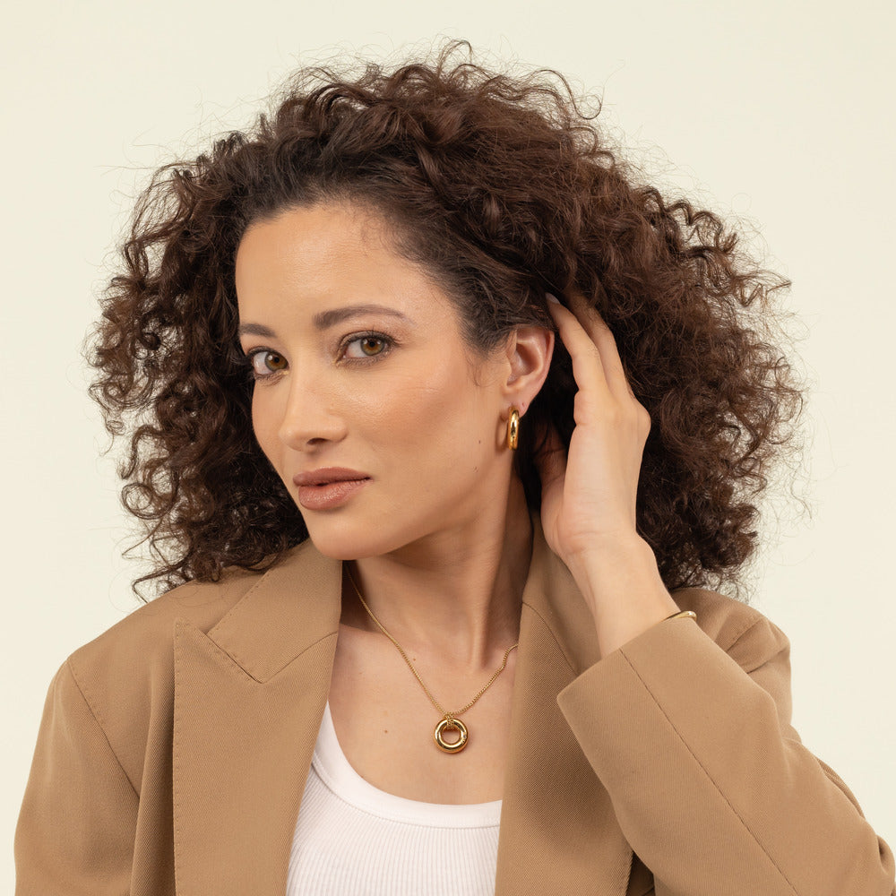 قرط نسائي ذهبي